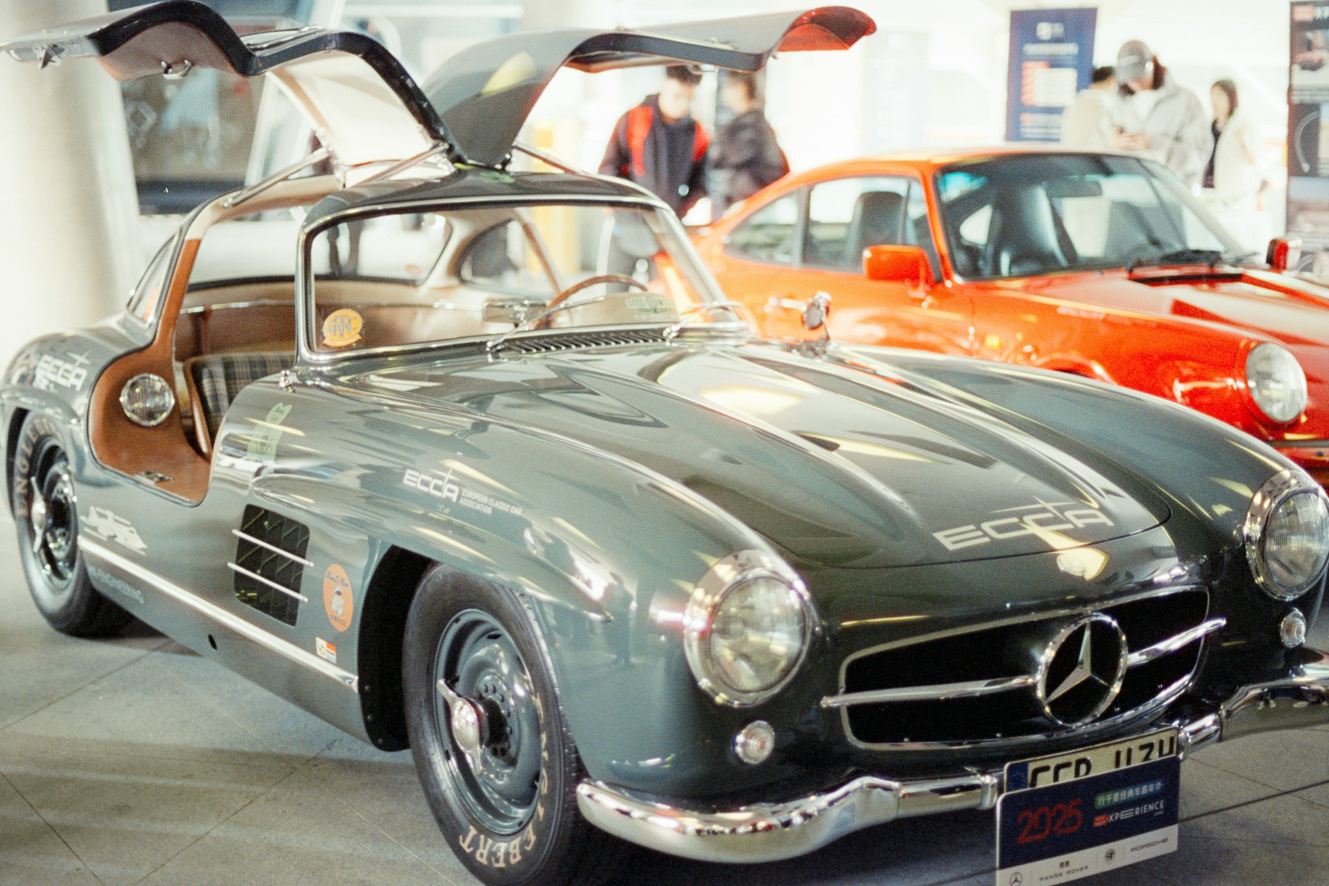Classic car and boat at a marina