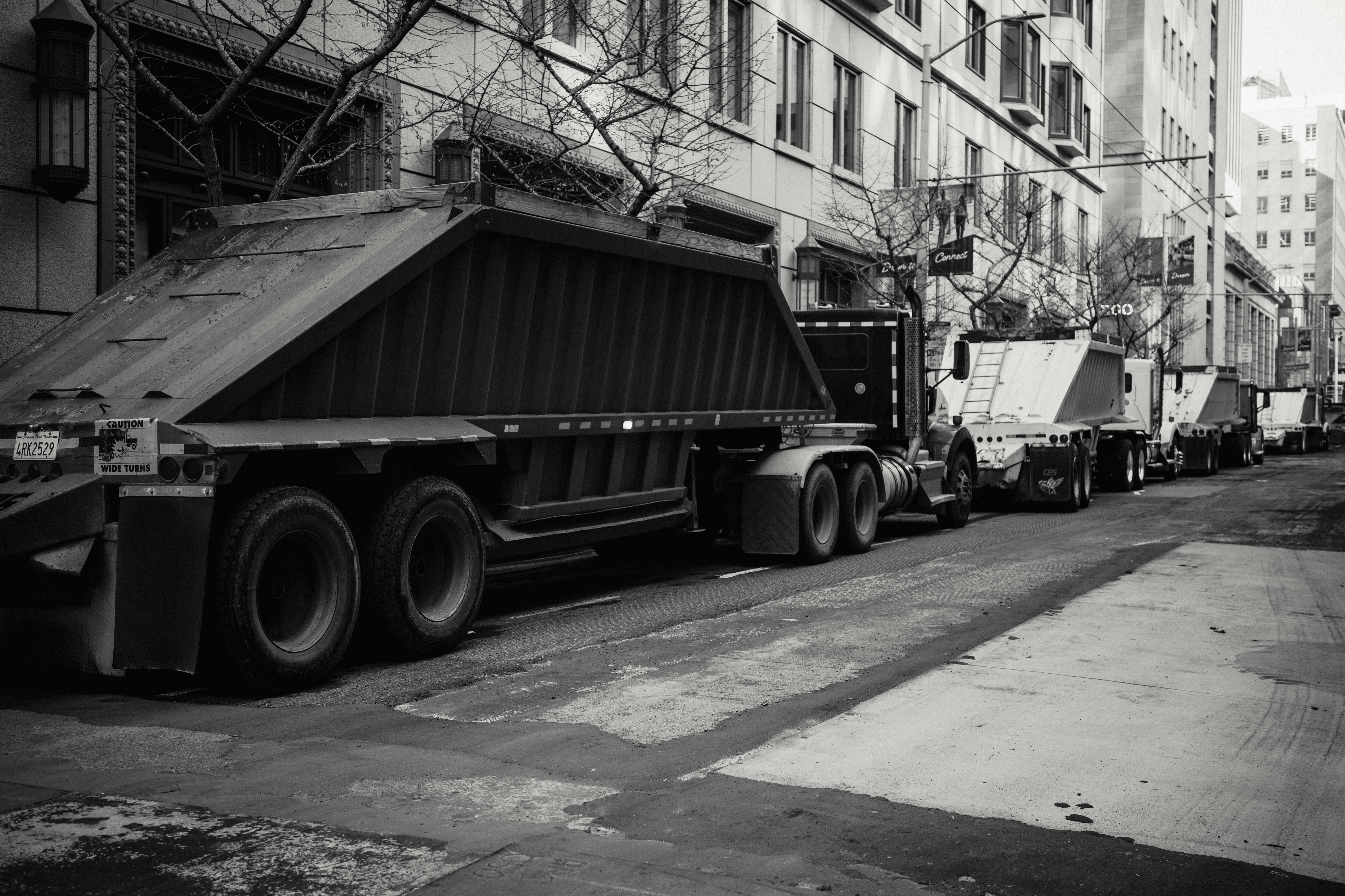 Commercial dump truck hauling sand and gravel