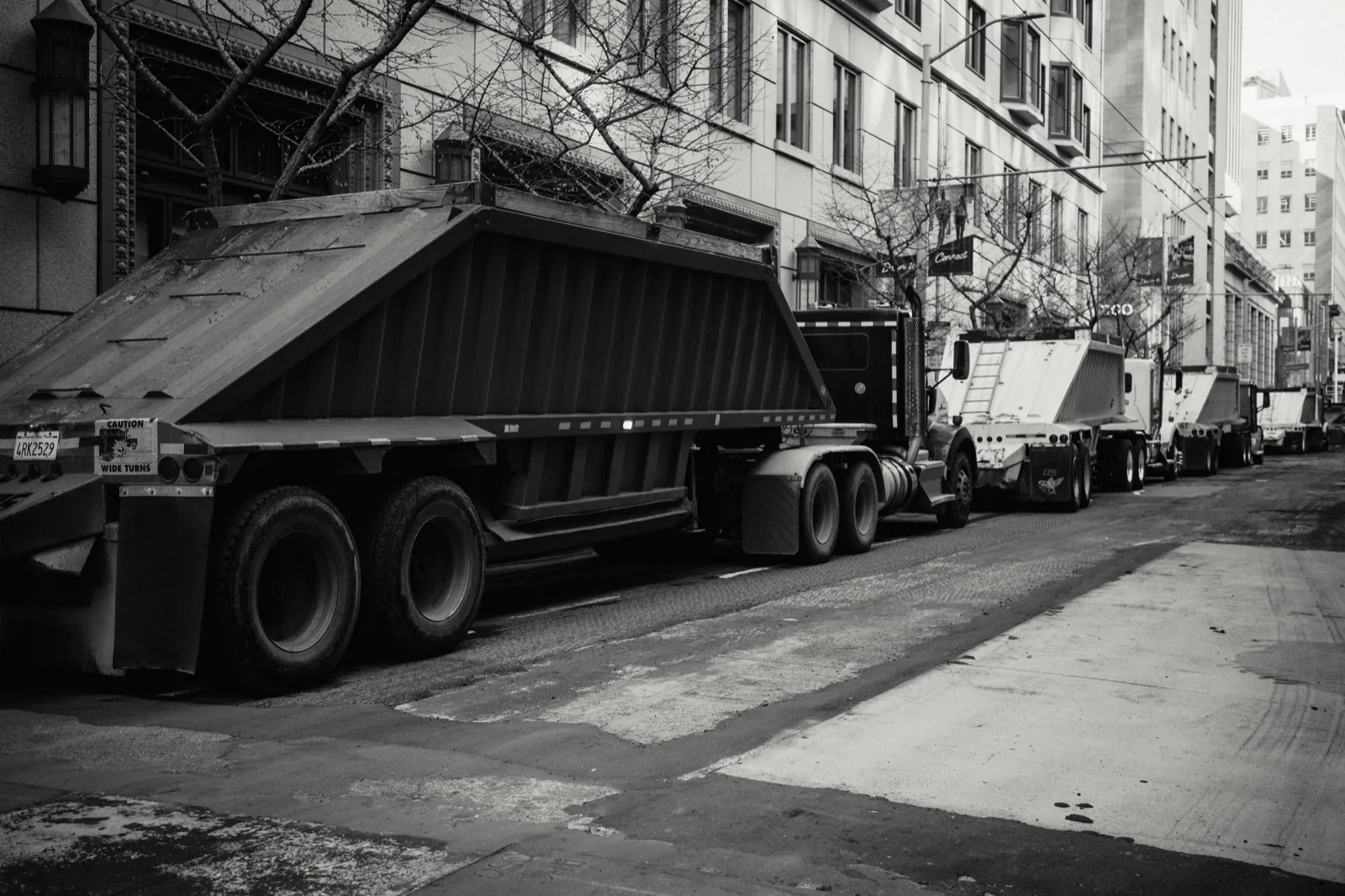 Commercial dump truck hauling sand and gravel